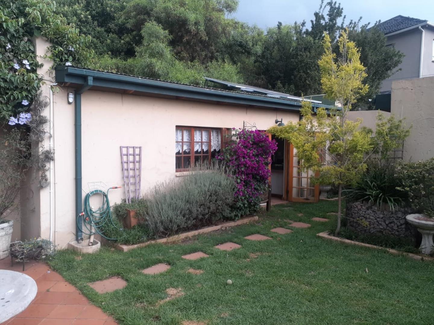 706897_Cottage_outside_solar.jpg